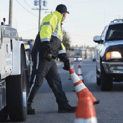 roadside assisting operator making safe